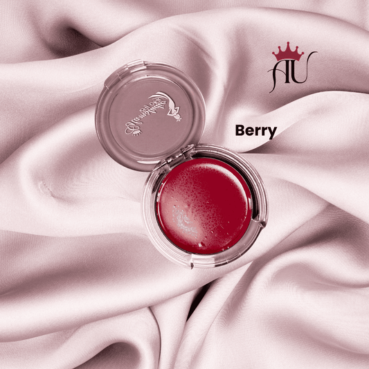Berry Cream Blush in bold berry-pink shade with hydrating, lightweight cream formula on pink satin background